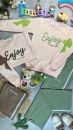 کد 849 سایز 50تا55 ست دخترانه طرح enjoy پارچه پنبه دورس استین گلدوزی با کیفیت - Image 2